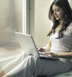 A woman with a laptop